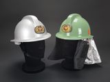 two hard hats that are sitting next to each other