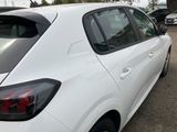 a picture of a white car parked in a parking lot