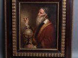 un vieux tableau représentant un homme tenant un globe terrestre dans la main