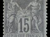 une photo en noir et blanc d'un timbre sur lequel figure le chiffre 15
