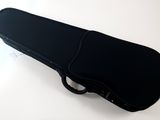 an image of a black guitar case on a white surface