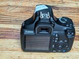 a camera that is sitting on a wooden table