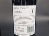 a bottle of wine that is sitting on a table