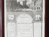 une vieille photo représentant un document encadré sur lequel figure l'image d'un château