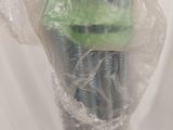 they are wrapped in plastic and ready to be placed in a vase