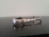 a spoon that is sitting on a table