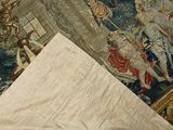 an image of a bed with a white sheet on it