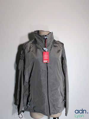 an image of a gray jacket on a mannequin stand