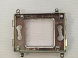 a close up of a metal frame on a white surface