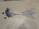 a close up of a bunch of wires laying on a floor