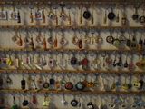 many key chains hanging on the wall in the room