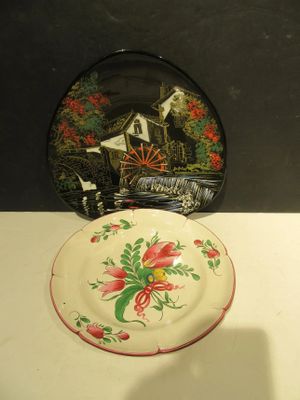 a plate with a picture on it sitting on a table