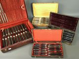 a lot of different types of pens in a case