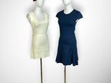 two mannequins that are standing next to each other