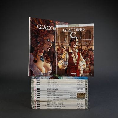 a lot of books that are stacked on top of each other
