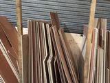 many pieces of wood stacked on top of each other