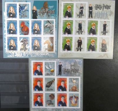 three stamps of harry potter and hermione are on display