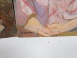 two paintings of a woman sitting next to each other