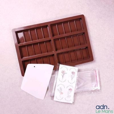 a chocolate tray that has a piece of chocolate in it