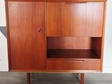 an image of a wooden cabinet with two doors and shelves