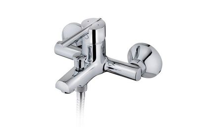 the faucet is attached to the wall with a hose