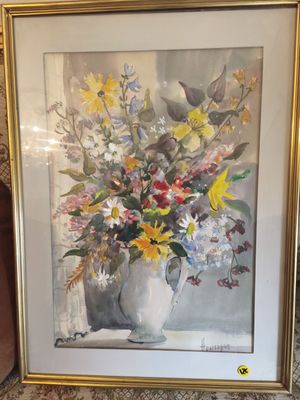painting of a vase of flowers in a gold frame on a table