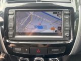 a picture of a car with a gps device on the dashboard