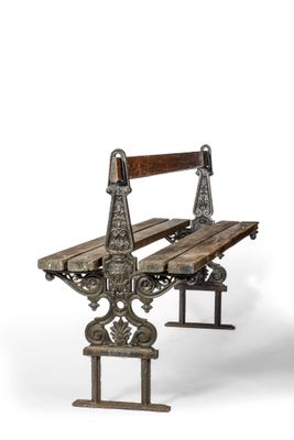 a wooden bench that is sitting on a metal stand