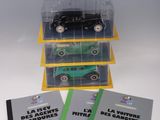 trois livres et une petite voiture sur une table