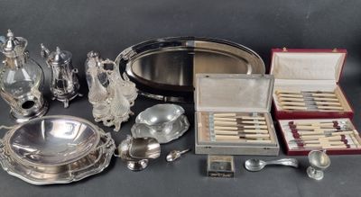 a lot of silver items that are on a table