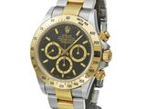 rolex watch with black dial and two tone gold bezel