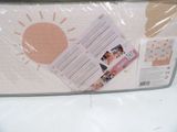 a box with a picture of a baby inside of it