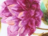 a picture of a painting of a flower on a table