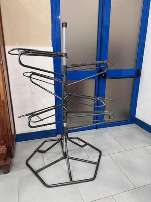 a picture of a rack of clothes in a room