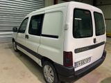 a white van that is parked in a garage