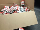a box of cigarettes and a bottle of water on the floor