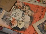 a pile of old books on a table