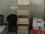 a pile of boxes and boxes in a room