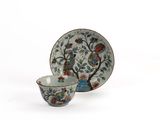 an image of a cup and saucer sitting on top of a white table