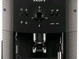 a close up of a coffee machine with coffee beans in it