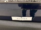 a sticker on the back of a black car