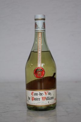 a bottle of wine that is sitting on a table