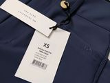 the back of a pair of pants with a tag on it