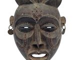 an african mask on a white background with a white background