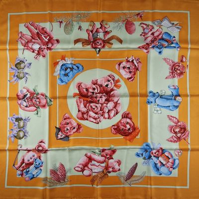 an image of a square scarf with a picture of a bunch of animals