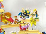 a lot of cartoon figurines that are on display