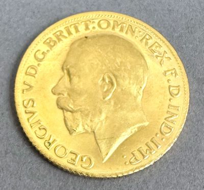l'image d'une pièce d'or sur laquelle figure le visage d'un homme