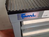 an image of a metal conveyor belt with a lot of labels on it