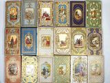 a lot of cards with pictures on them on the wall
