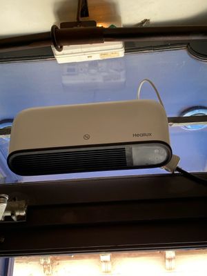 a picture of a projector on the ceiling of a bus
